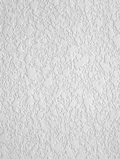 Orange peel texture sprayed across a finished wall