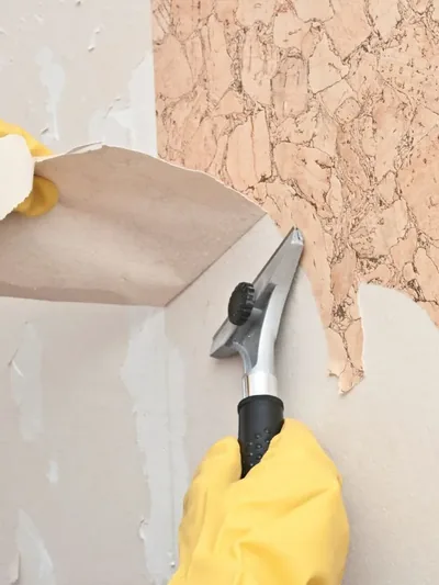 Dated wallpaper scraped from a wall during removal